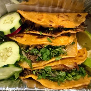 Colima Taqueria signature dishes Birria QuesatacosBirria Tacos Con ConsomméPollo Asado Quesatacos